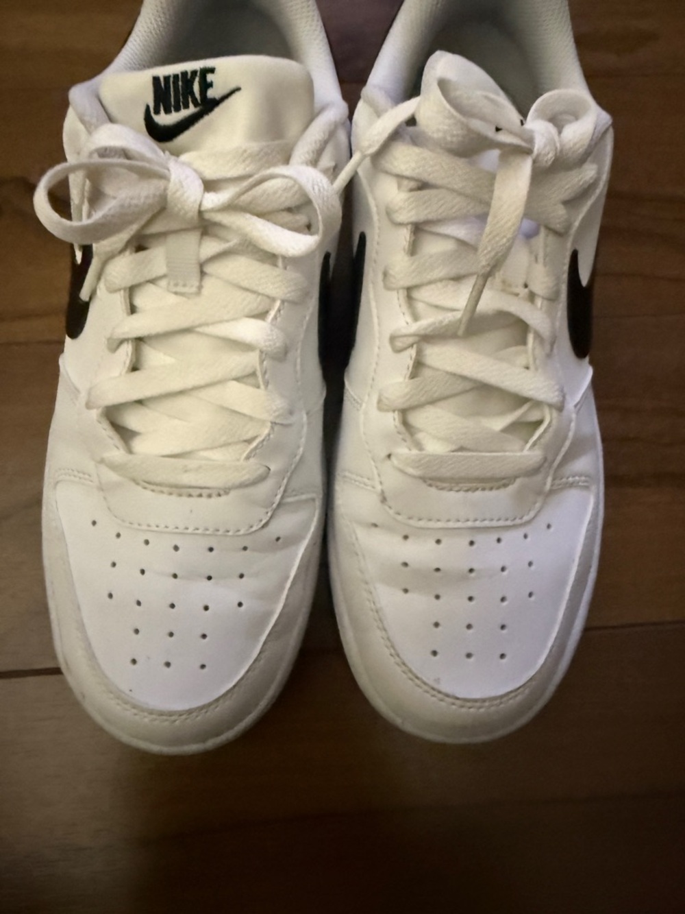 Nike White Sneakers with Black Swoosh and Logo
